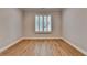 Clean bedroom with hardwood floors and modern window with plantation shutters at 1169 Dorby Park Ne Dr, Brookhaven, GA 30319