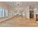 View from the living room featuring hardwood floors, custom millwork, and a bright, modern kitchen at 1169 Dorby Park Ne Dr, Brookhaven, GA 30319
