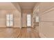 Bright, open-concept living room with wood floors and natural light at 1169 Dorby Park Ne Dr, Brookhaven, GA 30319