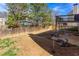 View of a fenced-in backyard with a patio, offering a private and secure outdoor space at 203 Overlook Ct, Dallas, GA 30157