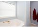 Cozy bathroom features a soaking tub and shower, plus storage for your essentials at 203 Overlook Ct, Dallas, GA 30157