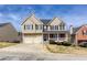Beautiful home featuring manicured landscaping and a covered front porch, providing curb appeal at 203 Overlook Ct, Dallas, GA 30157