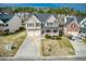 Charming two-story home with a three-car garage and inviting front porch at 203 Overlook Ct, Dallas, GA 30157
