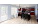Eat-in kitchen featuring stainless appliances and views to the deck at 203 Overlook Ct, Dallas, GA 30157