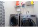 Convenient laundry room with modern washer and dryer at 203 Overlook Ct, Dallas, GA 30157