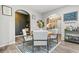 The dining room features an open concept with modern table and chairs at 364 Mossycup Dr, Fairburn, GA 30213