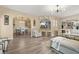 Expansive living room showcasing an open layout with views into the dining room and kitchen at 364 Mossycup Dr, Fairburn, GA 30213