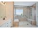 Accessible bathroom includes glass shower with seating and safety bars at 1460 Chamirey Sw Dr, Marietta, GA 30008