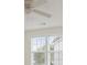 Bright bedroom with ceiling fan and window providing natural light at 1460 Chamirey Sw Dr, Marietta, GA 30008
