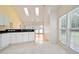 Open kitchen with modern appliances, breakfast bar, and lots of natural light at 1460 Chamirey Sw Dr, Marietta, GA 30008