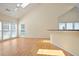 Spacious living room with lots of light from many windows features vaulted ceiling and hardwood floors at 1460 Chamirey Sw Dr, Marietta, GA 30008