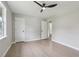 Large bedroom featuring hardwood floors, a window, and a ceiling fan at 2784 Oxford Dr, Decatur, GA 30034