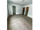 Spacious bedroom with new carpeting and ample closet space at 3609 Ginnis Rd, Atlanta, GA 30331