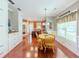 Cozy dining area featuring hardwood floors and built-in storage at 557 Pringle Dr, Suwanee, GA 30024