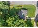 Aerial view of the property showing the lawn, garden, deck and surrounding neighborhood at 984 Ridgecrest Se Dr, Smyrna, GA 30080