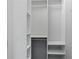 White closet with shelving and a hanging rod provides plenty of storage options at 984 Ridgecrest Se Dr, Smyrna, GA 30080