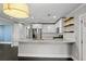 Bright kitchen features stainless steel appliances, granite countertops, and a center island at 984 Ridgecrest Se Dr, Smyrna, GA 30080