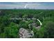 Aerial view featuring mature trees and skyline at 1348 Sheffield Glen Ne Way # 8, Atlanta, GA 30329