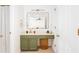 This bathroom offers green cabinets, gold accents, and a single vanity at 1348 Sheffield Glen Ne Way # 8, Atlanta, GA 30329