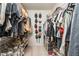 This walk-in closet has shoe racks, storage, and organizational space at 1348 Sheffield Glen Ne Way # 8, Atlanta, GA 30329