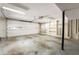 Spacious two-car garage with bright lighting and built-in shelving, ready for storage or projects at 1348 Sheffield Glen Ne Way # 8, Atlanta, GA 30329