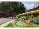 Elegant gated entrance with brick pillars and manicured landscaping, providing a secure and welcoming entry at 2459 Chestnut Lndg, Atlanta, GA 30360
