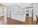An open kitchen featuring white cabinets and counter seating at 2459 Chestnut Lndg, Atlanta, GA 30360