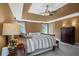 Comfortable bedroom with a king bed, ceiling fan and large dresser; a relaxing retreat at 2459 Chestnut Lndg, Atlanta, GA 30360