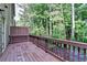 Wooden back deck overlooking a serene, wooded area, offering a peaceful retreat at 4232 Perimeter E Park # 110, Atlanta, GA 30341