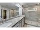 A spacious bathroom with double sinks and large tile shower at 4232 Perimeter E Park # 110, Atlanta, GA 30341