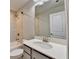 Bathroom featuring sink, toilet, bathtub, and tiled shower at 4232 Perimeter E Park # 110, Atlanta, GA 30341