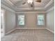 This bedroom features neutral carpet and paint with two windows at 4232 Perimeter E Park # 110, Atlanta, GA 30341