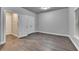 Cozy bedroom featuring hardwood floors, closet, and a window that offers natural light at 4232 Perimeter E Park # 110, Atlanta, GA 30341