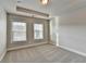Bedroom showcasing neutral carpet, recessed lighting, and windows at 4232 Perimeter E Park # 110, Atlanta, GA 30341
