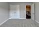 Bedroom featuring neutral carpet, recessed lighting, and an adjacent closet at 4232 Perimeter E Park # 110, Atlanta, GA 30341