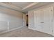 This bedroom features neutral carpet, paint, and a closet at 4232 Perimeter E Park # 110, Atlanta, GA 30341