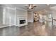 Open floor plan living room with hardwood floors and a kitchen island at 4232 Perimeter E Park # 110, Atlanta, GA 30341