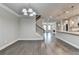 Bright and spacious living area showcasing hardwood floors and a staircase at 4232 Perimeter E Park # 110, Atlanta, GA 30341