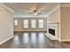 Spacious living room with a modern ceiling fan and fireplace at 4232 Perimeter E Park # 110, Atlanta, GA 30341