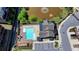 Aerial view of a community pool with a pond and fountain nearby offering residents a tranquil place to relax at 4232 Perimeter E Park # 110, Atlanta, GA 30341