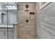 A spacious shower with a niche for storage at 4232 Perimeter E Park # 110, Atlanta, GA 30341