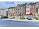 Beautifully built townhomes with attached garages, classic brick exteriors, and manicured landscaping at 4232 Perimeter E Park # 110, Atlanta, GA 30341