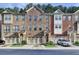 Charming townhome with brick exterior, two-car garage, and beautifully landscaped front yard at 4232 Perimeter E Park # 110, Atlanta, GA 30341
