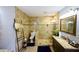 Bathroom featuring tile flooring, glass enclosed shower and updated sink area at 5567 Executive Way, Norcross, GA 30071
