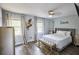 Bright bedroom features wood look floors and dual windows at 5567 Executive Way, Norcross, GA 30071