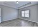 Bedroom with a window and light vinyl floors at 68 Hardy Water Dr, Lawrenceville, GA 30045