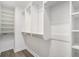 Spacious walk-in closet with custom shelving and rods at 1704 Evenstad Way, Smyrna, GA 30080