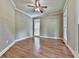 Neutral bedroom with hardwood floors, crown molding, and plenty of natural light at 310 River Birch Ct, Canton, GA 30114