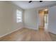 Comfortable bedroom with light-colored walls and hardwood flooring, offering a relaxing ambiance at 4131 Carroll St, Covington, GA 30014