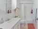 Clean bathroom featuring a bathtub with shower and ample storage space in white cabinets at 5400 Roswell Rd # Apt L6, Sandy Springs, GA 30342